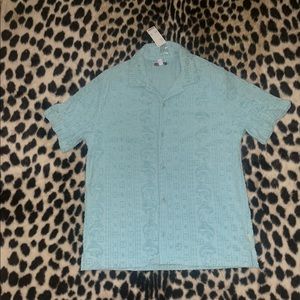 Men’s UO Terry cloth button up.